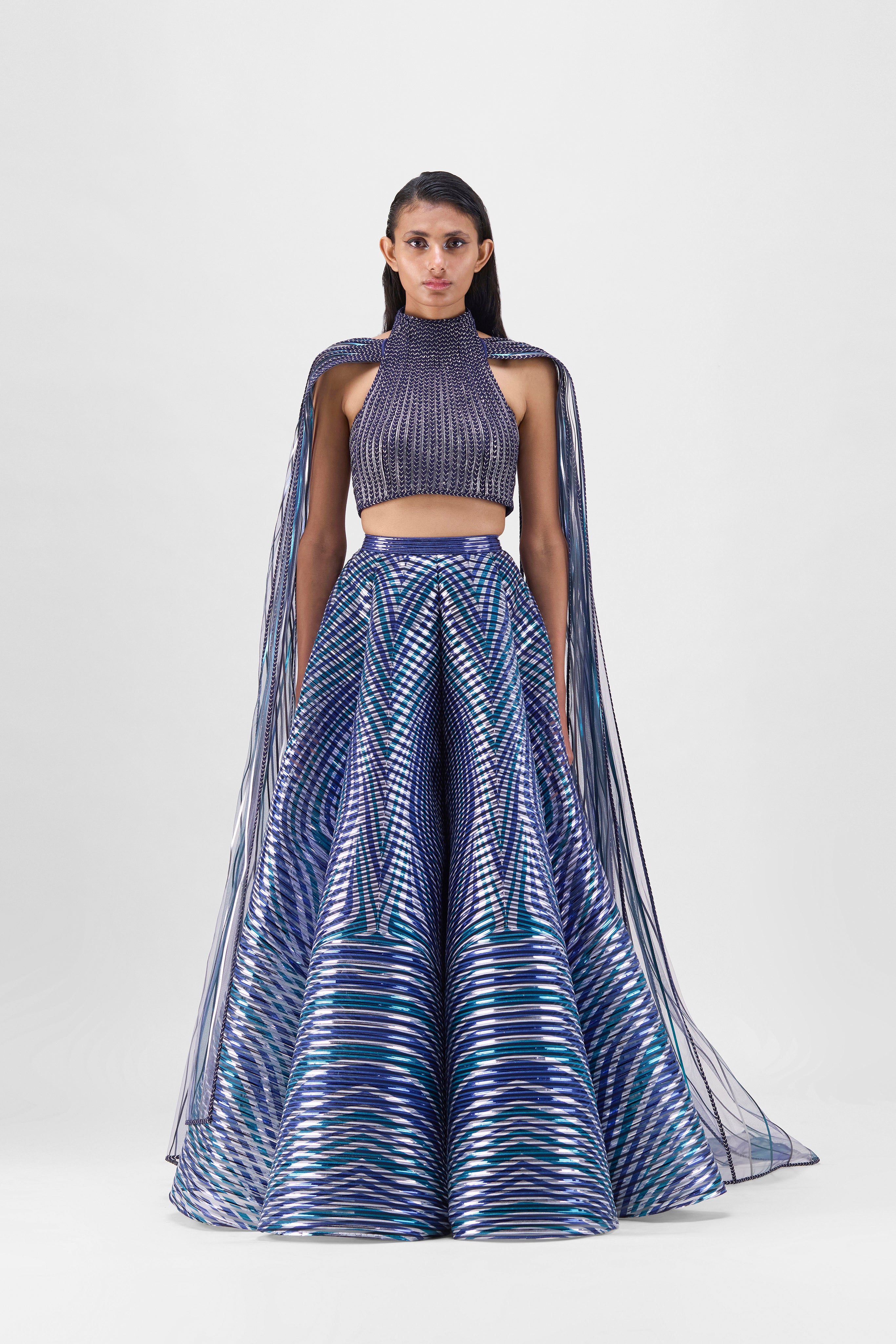 METALLIC BRAIDED HALTER TOP WITH A FLUTED TULLE PRINTED SKIRT