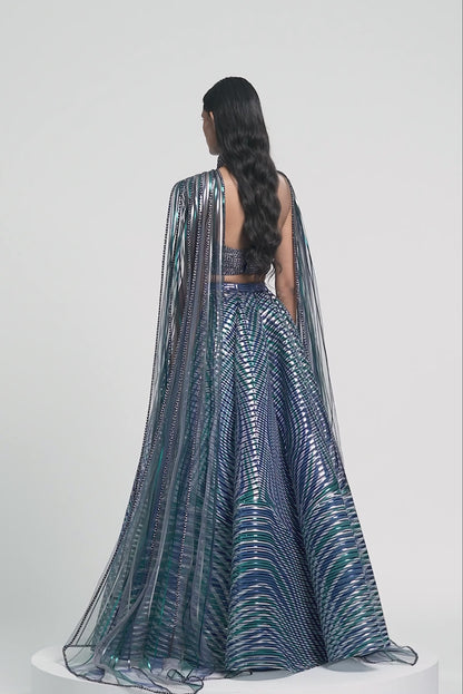 METALLIC BRAIDED HALTER TOP WITH A FLUTED TULLE PRINTED SKIRT